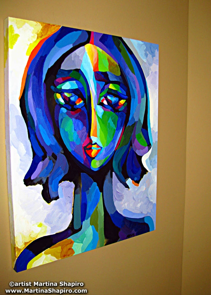 blue woman portrait on a wall - artist martina shapiro